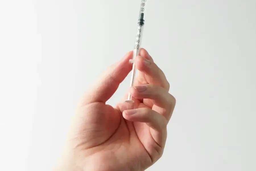 Dry Needling for Chronic Muscle Knots Bangalore Dry needling for chronic muscle knots trigger points Bangalore — physiotherapist inserting sterile filiform needle into upper-trapezius trigger point during safe Grade-2 dry-needling protocol at Pro Physiotherapy JP Nagar