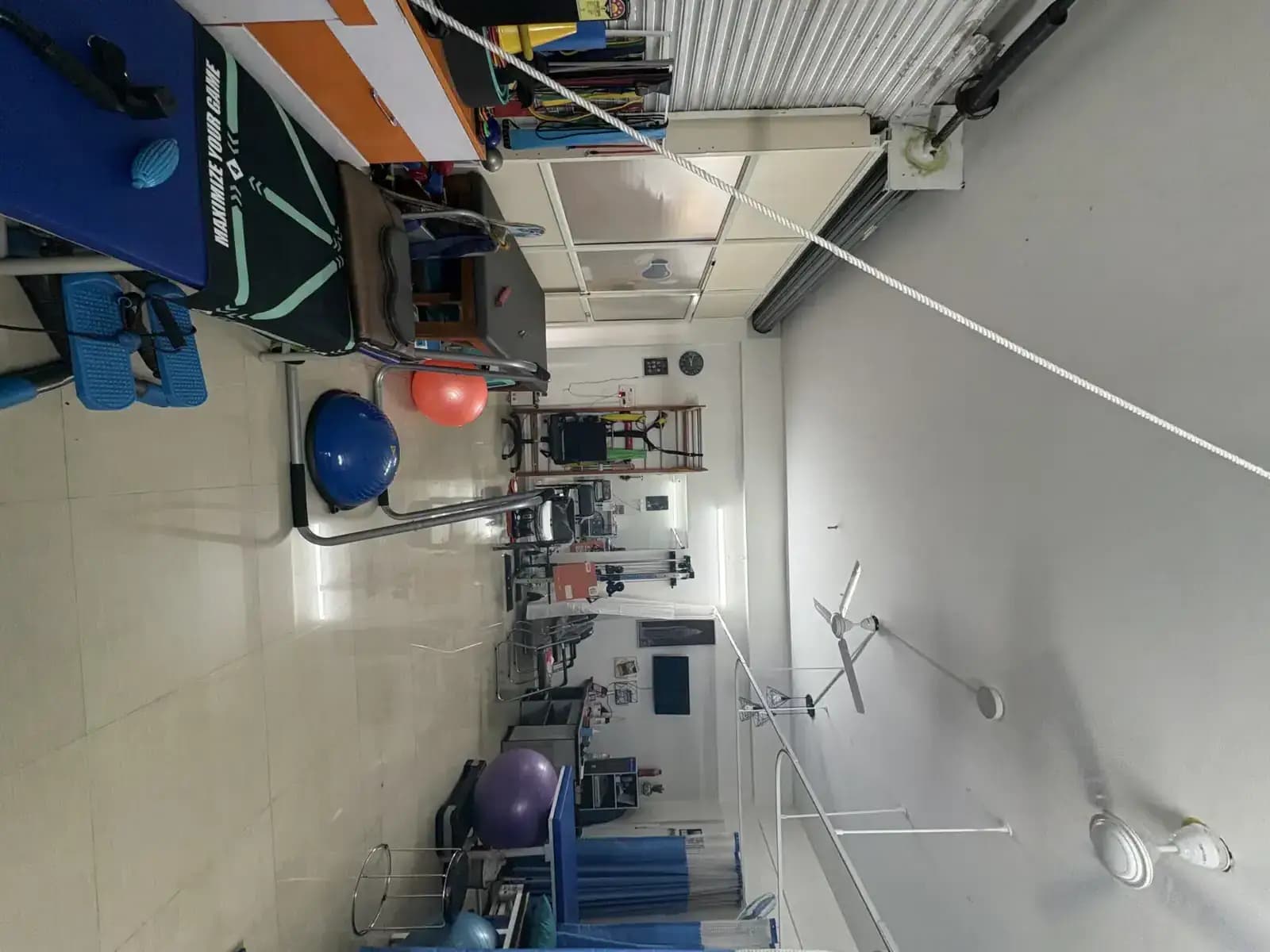 Pro Physiotherapy JP Nagar 8th Phase — ankle sprain rehabilitation room interior Pro Physiotherapy clinic interior view — ankle sprain treatment room at JP Nagar 8th Phase Bangalore. Grade 1, grade 2 and grade 3 lateral ankle sprain rehabilitation with BAPS balance board, proprioception, therapy balls, wobble platform and manual therapy.