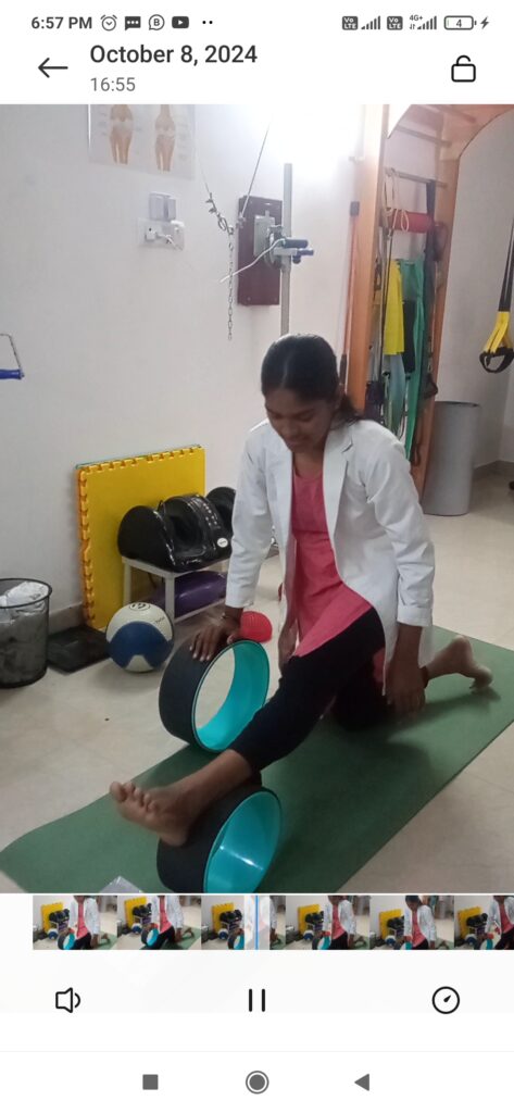 Physiotherapist in Pro Physiotherapy demonstrating stretching exercises for muscle stiffness